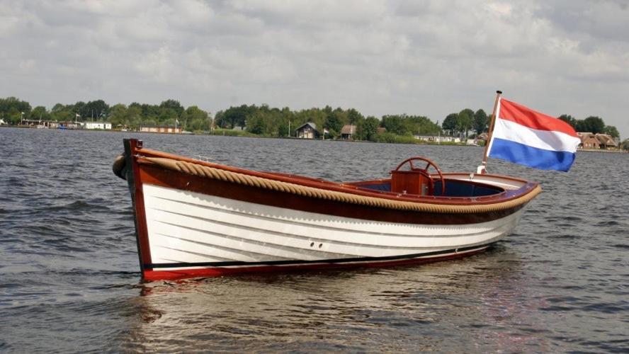 Holiday home The Boathouse With Boat